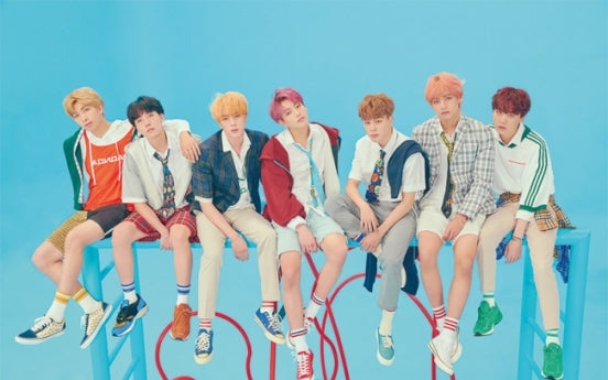 BTS sends message of carpe diem through festive mood of 'Idol'